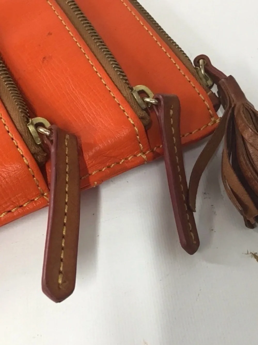 Dooney & Bourke Orange Leather Messenger Bag with Brown Trim